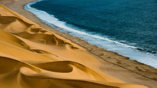 Beach wave sand dunes ocean - a wave free wallpaper