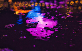 Puddle colorful lights black surface - a puddle of water free wallpaper
