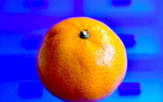 Orange blue moon crescent planet - a black dot free wallpaper