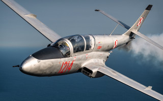 Silver airplane ocean smoke red - a red stripe free wallpaper