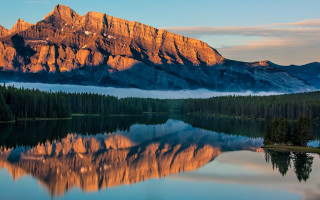 Mountain range reflection forest foggy 2 - a forest in the foreground free wallpaper