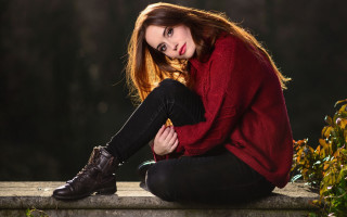 Woman sitting ledge red sweater - a ledge free wallpaper