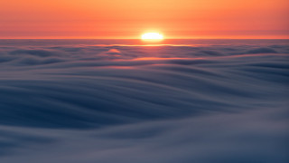 Sunset ocean waves horizon fog - volumetric fog free wallpaper