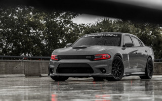 Grey car parking lot rain - a grey car free wallpaper