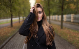 Woman park longhair bokeh coat - flowing free wallpaper