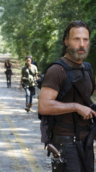 Bearded man gun walking road - ada gladys killins free wallpaper