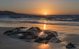 Sunset ocean rocks beach mountain - the sand and water free wallpaper