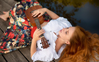 Woman ukulele dress blur portrait - a wooden deck free wallpaper