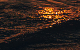 Ocean wave night sunset reflection - in the ocean free wallpaper