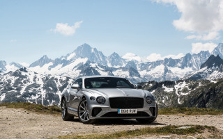 Silver car mountain road tilt - a dirt road in front free wallpaper