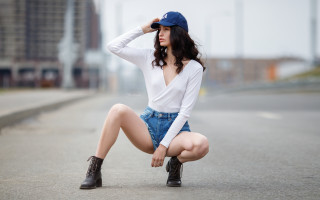 Woman kneeling road hat boots - the side of a road free wallpaper