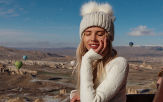Woman smiling white sweater hat - a white hat free wallpaper