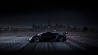 Black sports car city skyline 2 - a city skyline in the background free wallpaper