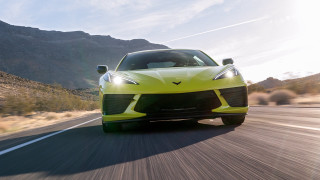 Yellow sports car desert mountains 2 - a road in the desert free wallpaper