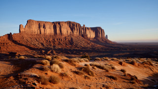 Mountain rock formation bushes desert - a large mountain free wallpaper