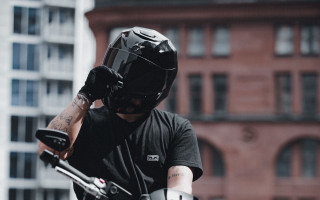 Man helmet motorcycle city neoism - a man in a helmet free wallpaper