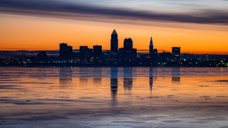 City skyline sunset reflection water - cleve gray free wallpaper