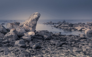 Large rock beach ocean cloudy - abstract free wallpaper