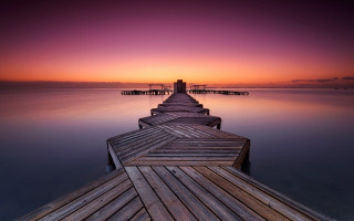 Sunset dock pier cityscape mountain - perfect symmetry free wallpaper
