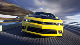 Yellow car road bridge fence - a yellow car free wallpaper