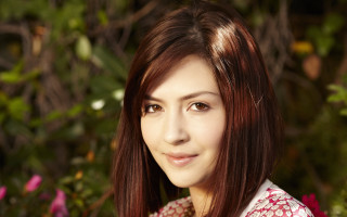 Woman smiling flowery shirt bush - flowery free wallpaper for desktop