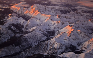 Mountain sunset embers fire cave - an airplane window free wallpaper for desktop