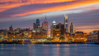 City skyline sunset water boat - a boat in the foreground free wallpaper
