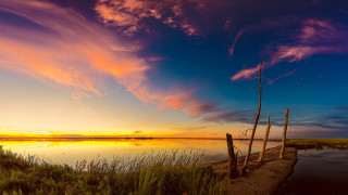 Sunset lake fence mystical colors - a sunset over a lake free wallpaper