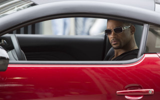 Red car man sunglasses driving - a red car free wallpaper