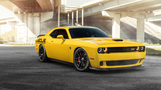 Yellow car parked bridge building 2 - a yellow car free wallpaper