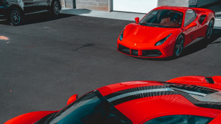 Red sports car parking lot 31 - a parking lot next free wallpaper