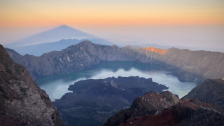 Mountain lake reflection sky clouds 2 - a lake in the middle of it free wallpaper