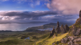 Mountain lake clouds cityscape sunset - a lake in the distance free wallpaper