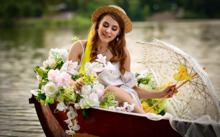 Woman boat umbrella flowers smiling - an umbrella free wallpaper