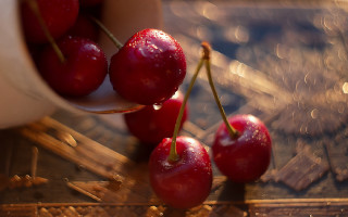 Cherry hand macro photorealism blurry - a bunch of cherries free wallpaper
