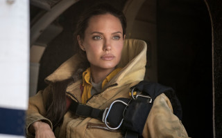 Woman yellow jacket window camera - a yellow jacket free wallpaper