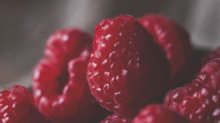 Raspberries water droplets macro closeup 2 - a white cloth free wallpaper