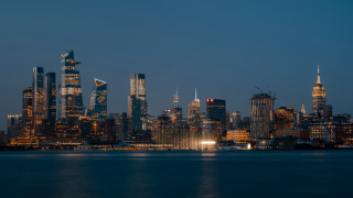 Hudson river night cityscape boat - a boat in the foreground free wallpaper