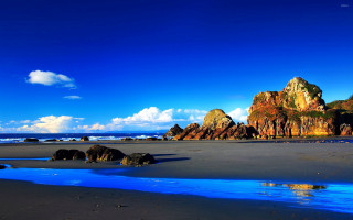 Beach rocks water blue sky - a beach free wallpaper