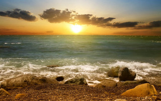 Sunset ocean rocks shore clouds - the shore free wallpaper