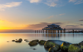 Pier building sunset rocks water - a pier free wallpaper