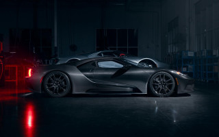 Black sports car red light 7 - a dark garage free wallpaper