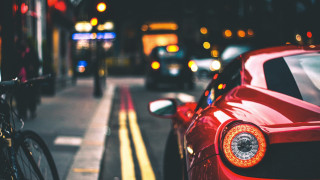 Red sports car street bokeh - focus free wallpaper