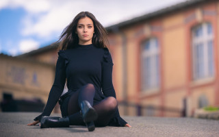 Woman black dress sitting outdoors - brigette barrager free wallpaper