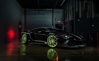 Black car neon green wheels - a garage free wallpaper