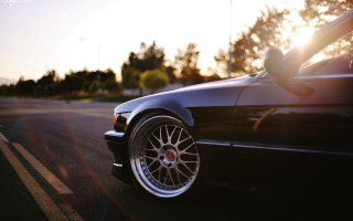 Black car sunset tree silhouette - a black car free wallpaper