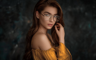 Woman glasses yellow dress portrait - her right hand free wallpaper