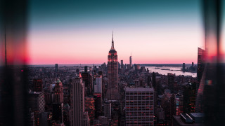 Nyc sunset cityscape bridge ferriswheel 2 - a view of a city free wallpaper