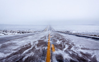 Snowy road planet ocean shore - a long road free wallpaper