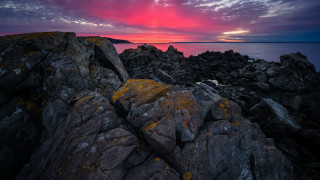 Rocky shore mountain sunset ocean - a rocky shore free wallpaper